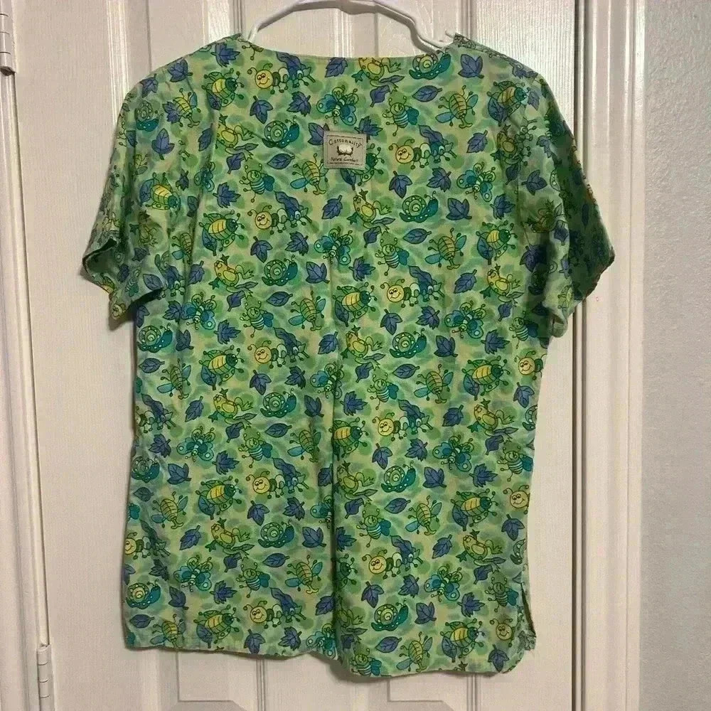 Woman’s green Scrub set size large like new- with catapults and leaves - Picture 4 of 7